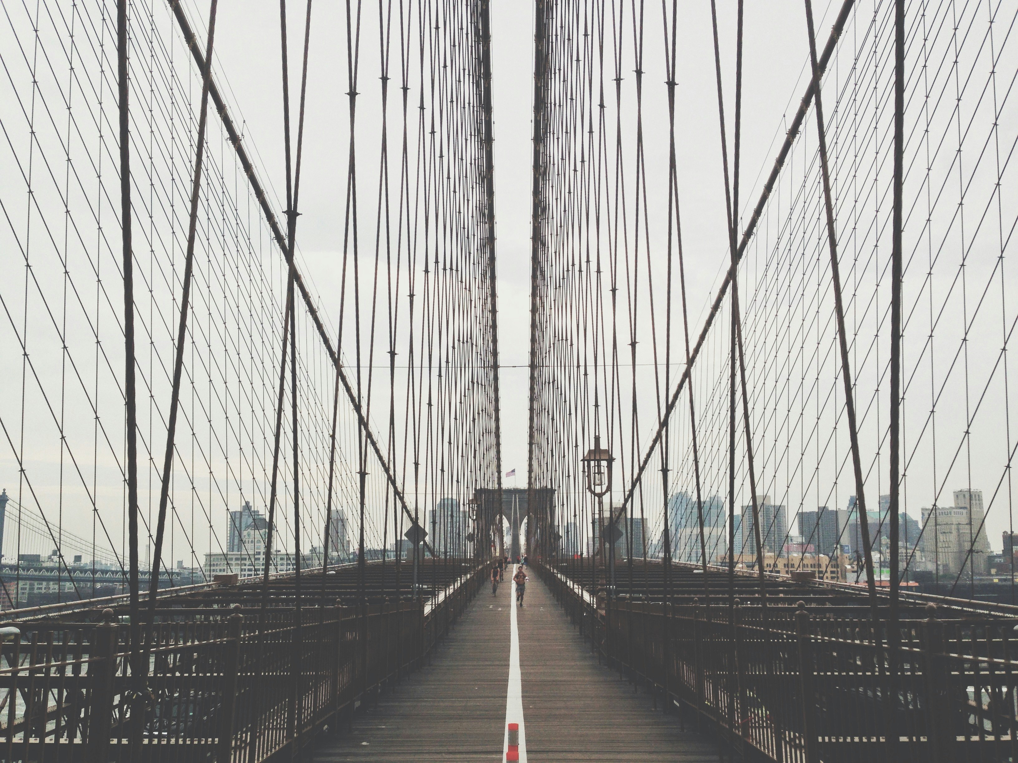 person running on bridge